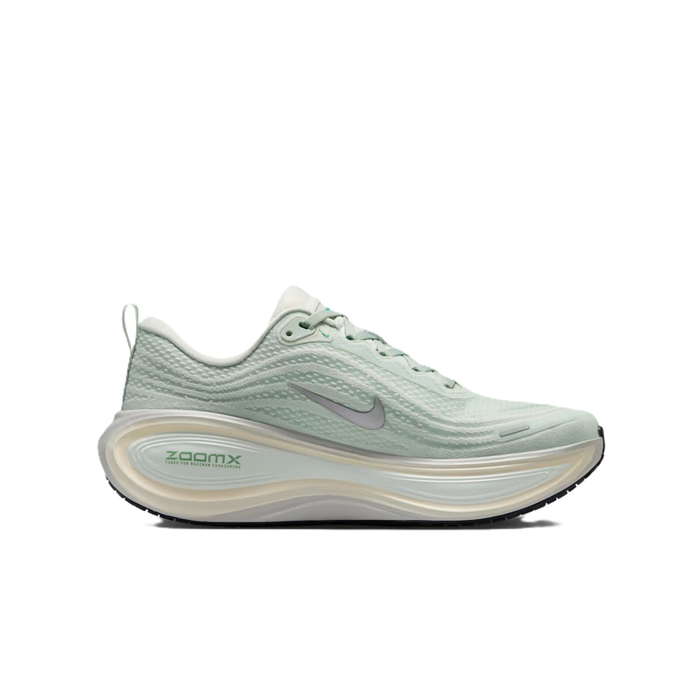 Nike Vomero Plus light silver side view with metallic Swoosh and ZoomX branding