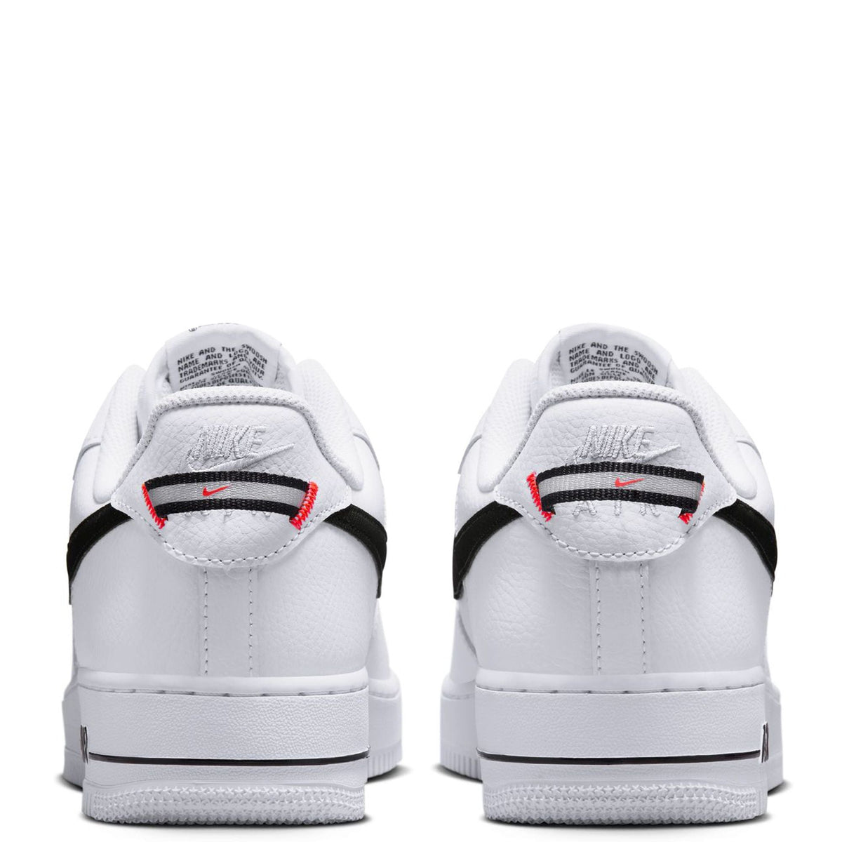 Men's Nike Air Force 1 sneakers heel view, red accent and Nike branding on white