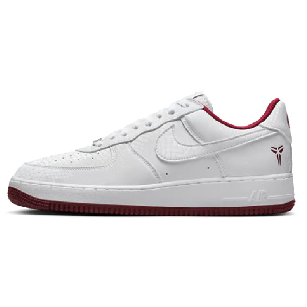 Nike Kobe low-top sneakers in white with red-trim collar and maroon outsole edge