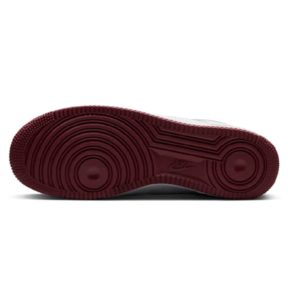 Nike Kobe rubber outsole in maroon with herringbone tread and circular traction pods