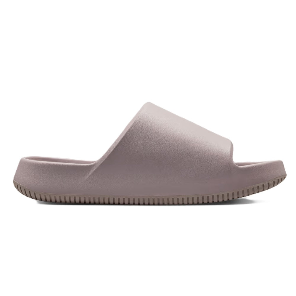Men's Nike Calm Slide 2.0 slide sandals in light purple, molded footbed and strapless design.