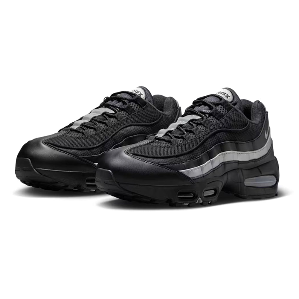 Pair of black Air Max 95 sneakers with lace-up uppers and silver side stripes