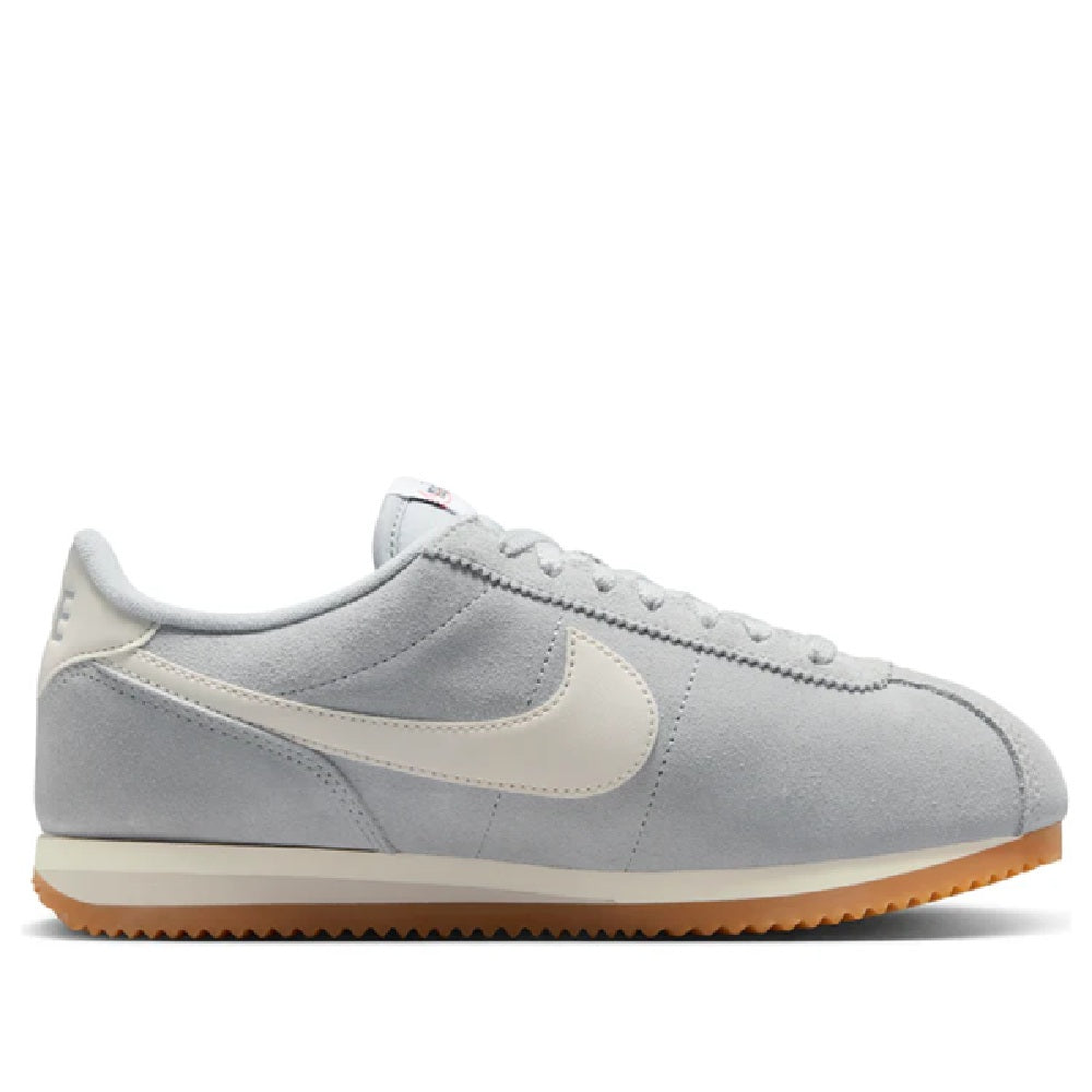 Women's Nike Cortez LT low-top sneakers, smoke gray suede, beige Swoosh, gum sole.