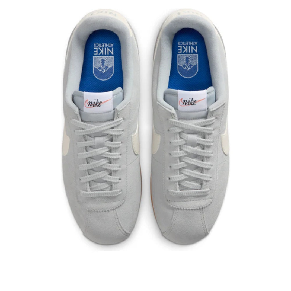 Women's Nike Cortez LT sneakers, white laces, smoke gray uppers, blue inner lining.