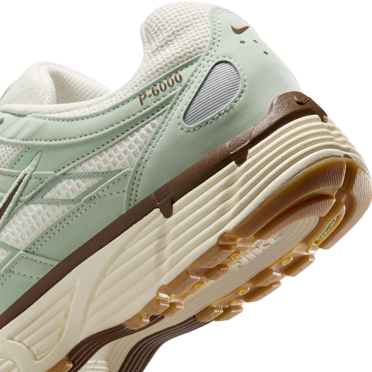 Nike P-6000 SE close-up, seafoam upper with ribbed midsole and brown outsole