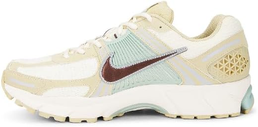 Nike men's running shoe, side view with cream upper, light blue panel and dark swoosh