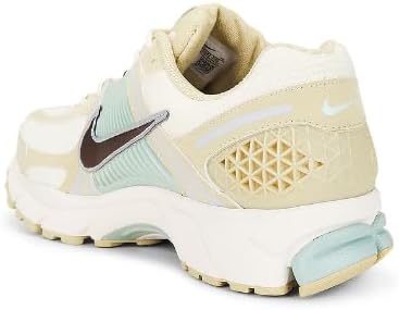 Nike men's running shoe, back three-quarter view with cream heel and light blue accents