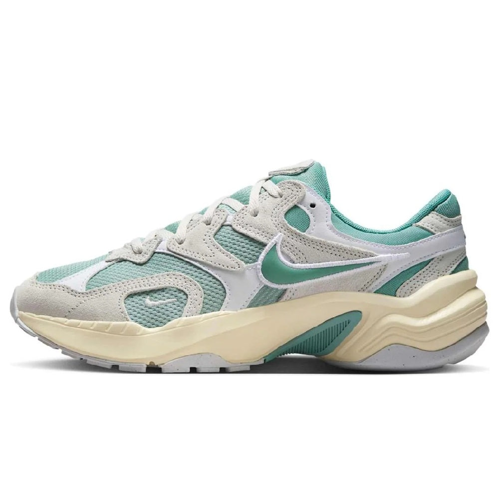 Women’s athletic sneaker in light gray with teal accents and cream sole