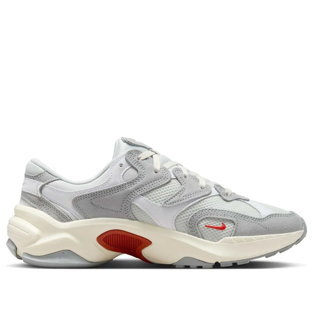 Nike women's sneakers, light gray upper with red logo and cream midsole detail