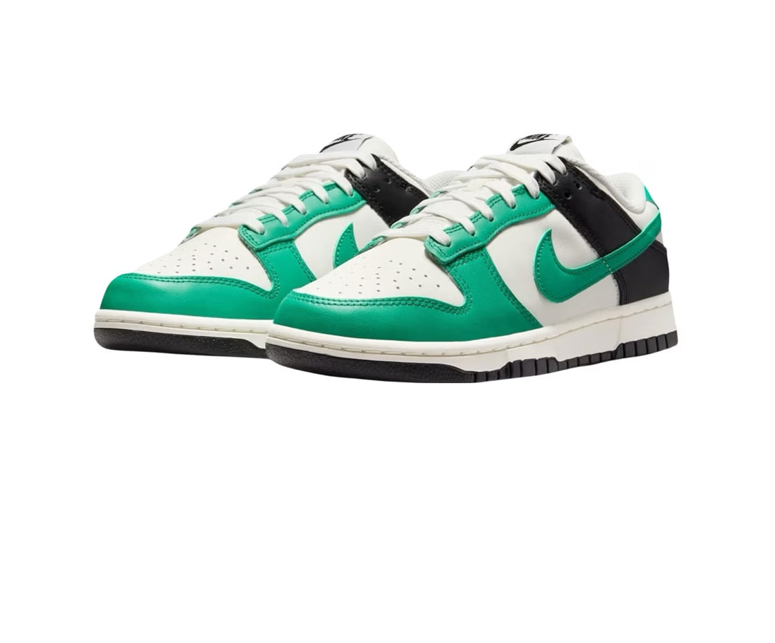 Nike Dunk Low sneakers in sail white, green, and black; pair from front