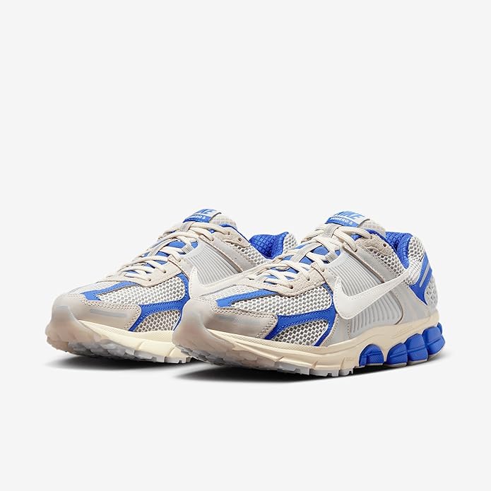 Nike Zoom Vomero 5 running sneaker front view, blue laces with white and royal accents