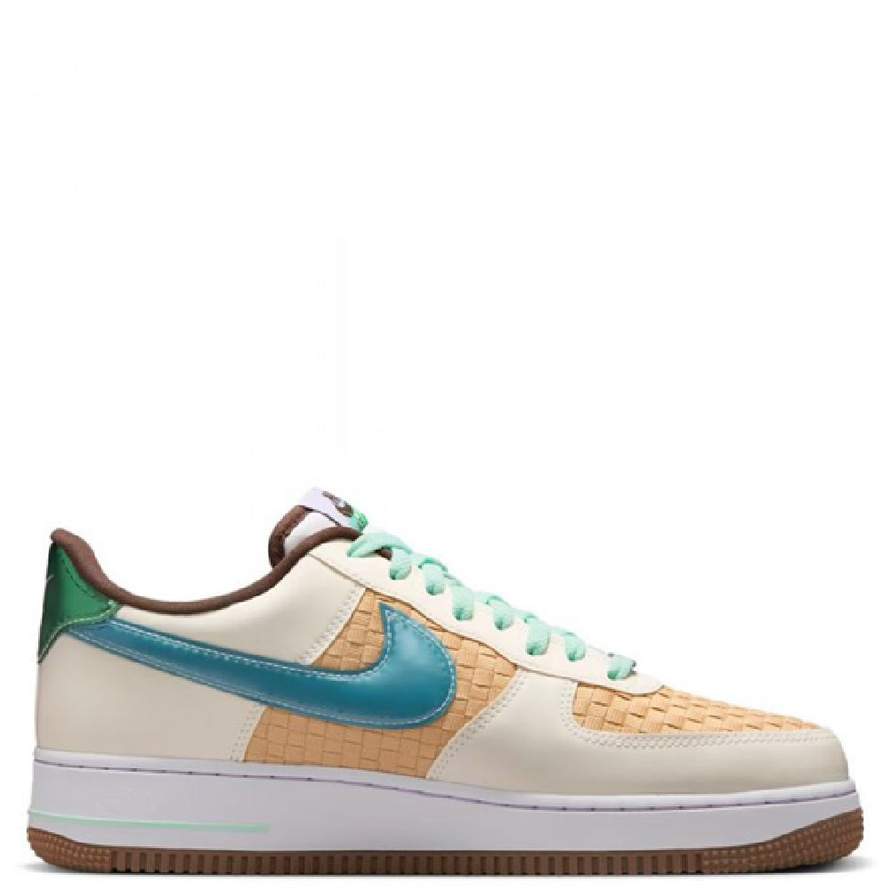 Nike Air Force 1 low sneakers side view, white upper with blue swoosh and mint laces