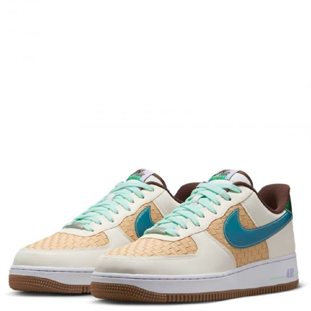 Nike Air Force 1 low sneakers pair, white leather with blue swoosh and mint-green laces