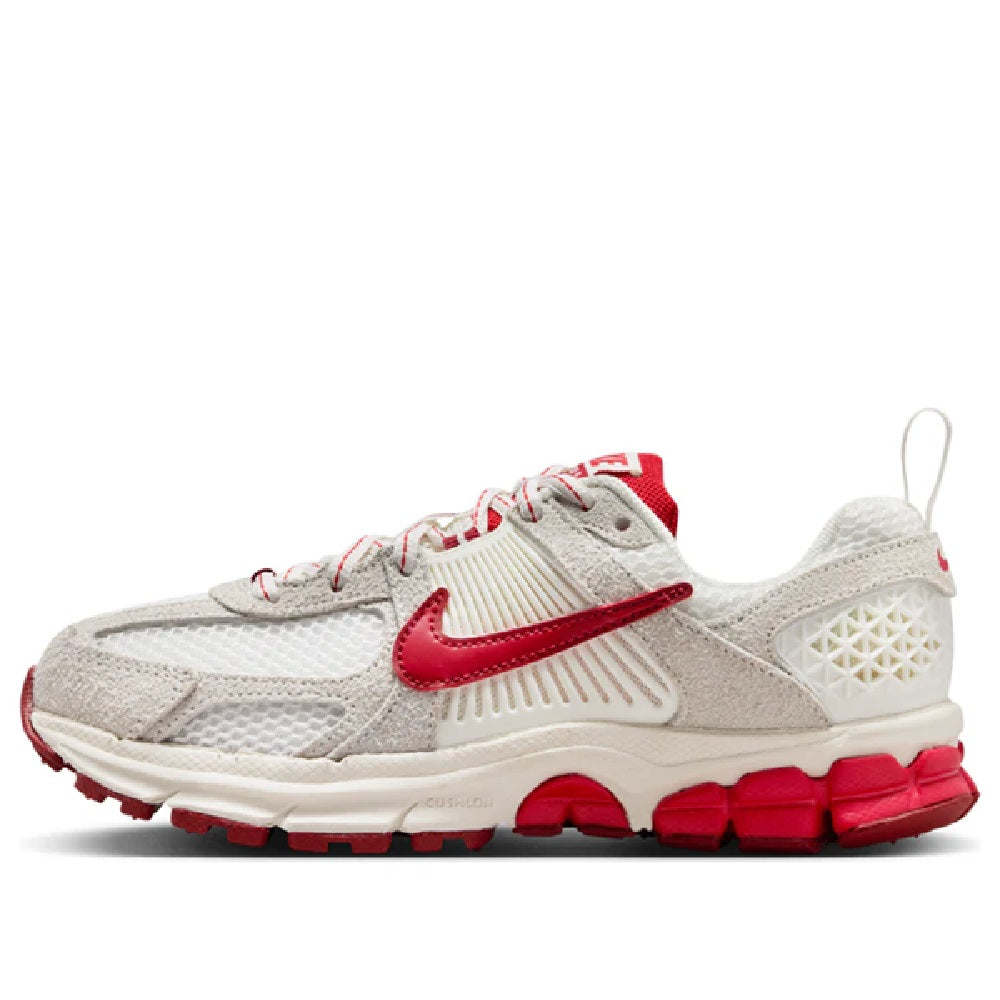 Big kid's Nike Vomero 5 SE running shoes, sail white with red swoosh and chunky sole
