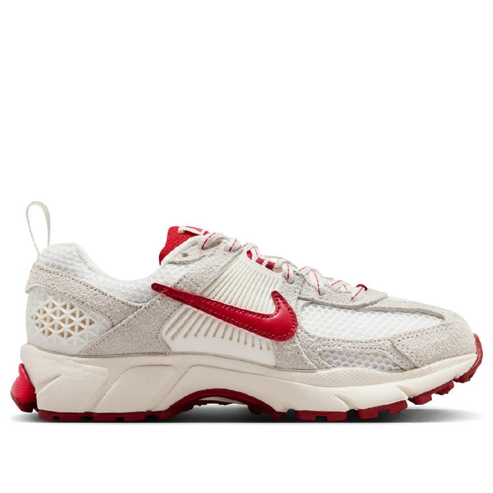 Big kid's Nike Vomero 5 SE running shoes, sail upper with red side logo and heel guard