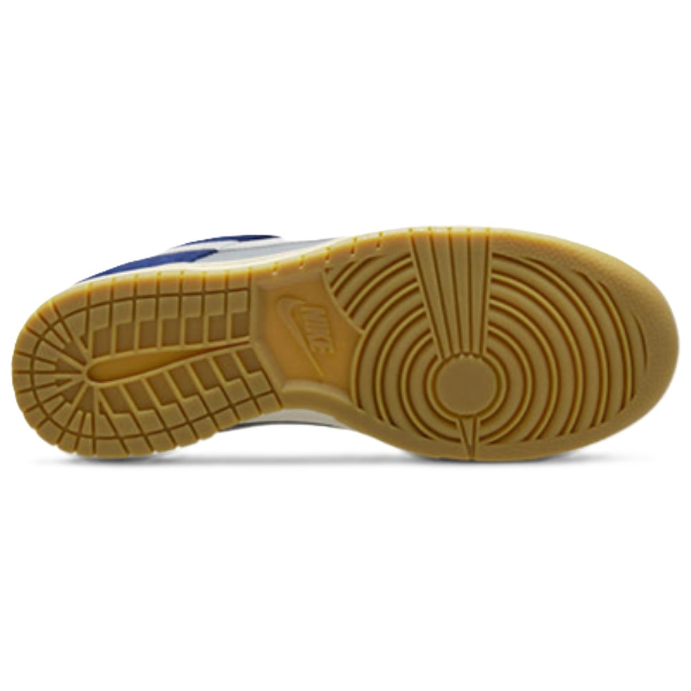 Gum rubber outsole with circular traction pattern for low-top sneakers