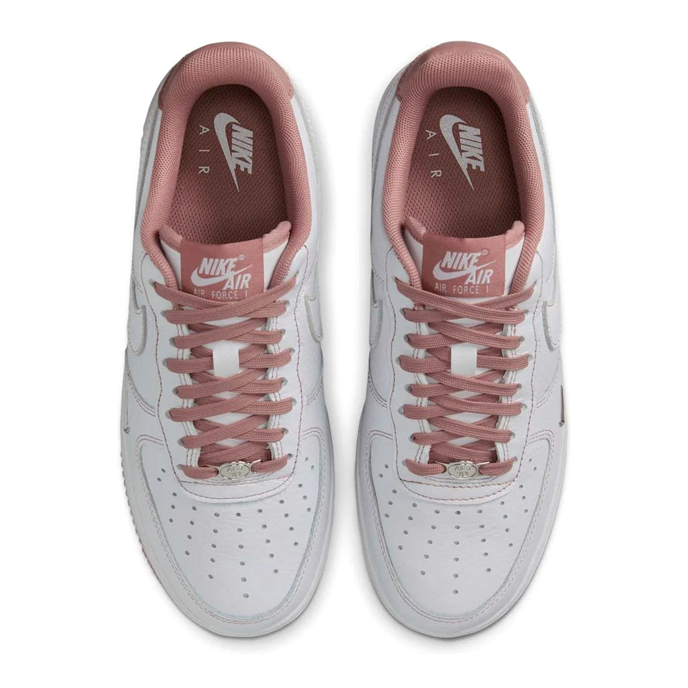 Nike Air Force 1 sneakers, pink tongue lining and lace-up front detail
