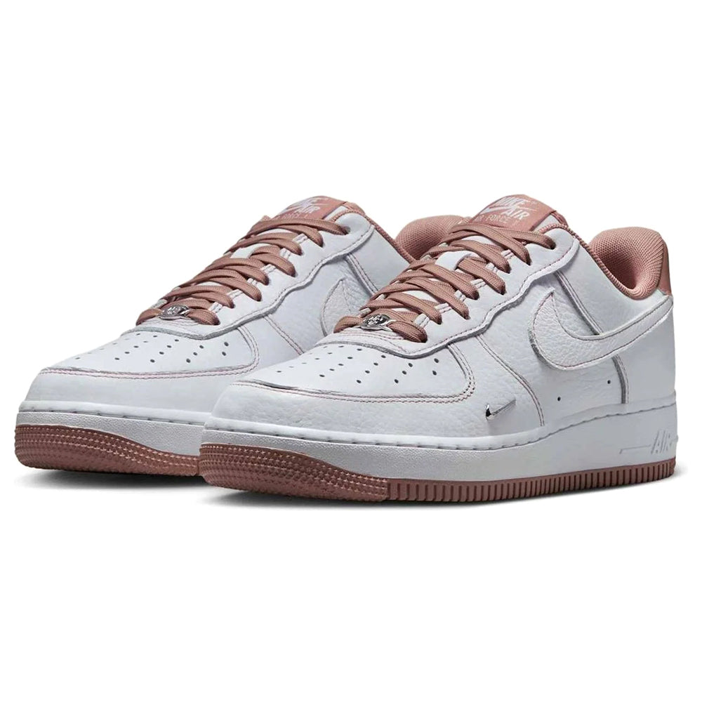 Nike Air Force 1 sneakers, white uppers with dusty pink overlays and brown outsole