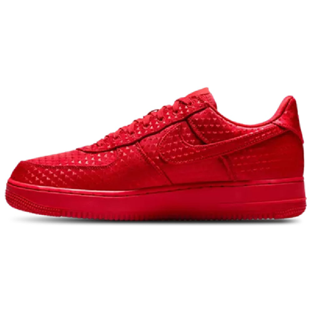 Red Nike Air Force 1 low-top sneakers with stitched panels and lace-up