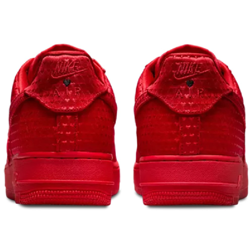 Red Nike Air Force 1 sneakers with heel tab showing Nike Air logo