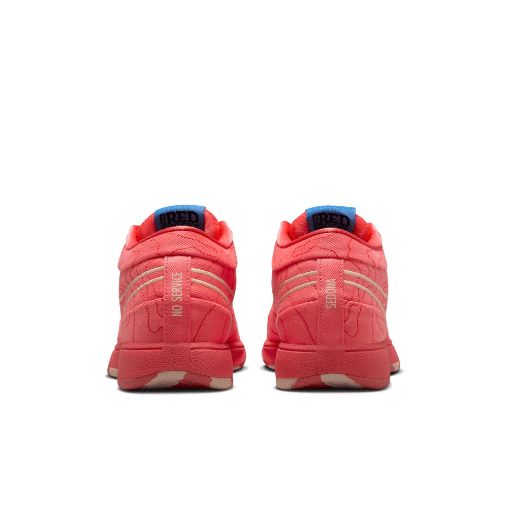 Red men's Nike sneakers, heel view with back tab and cushioned collar