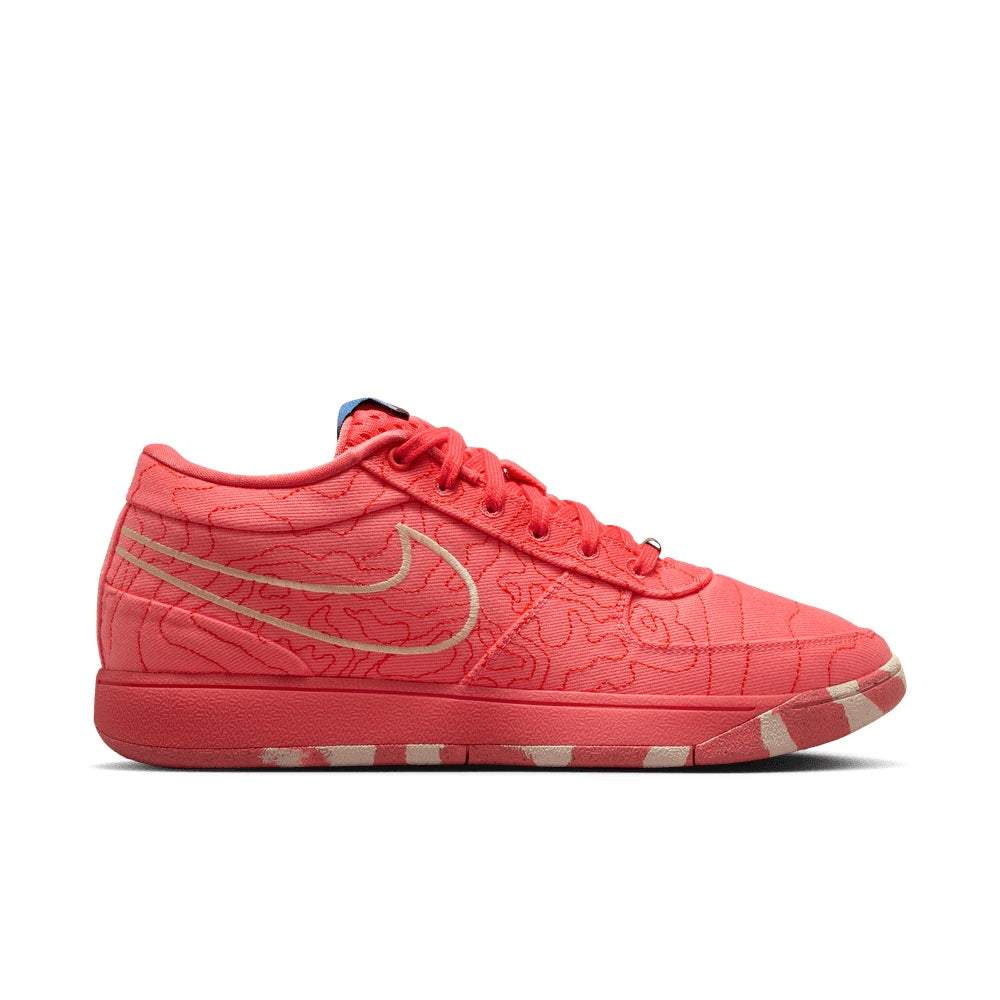 Red men's Nike sneakers, side view with white Swoosh and lace-up closure