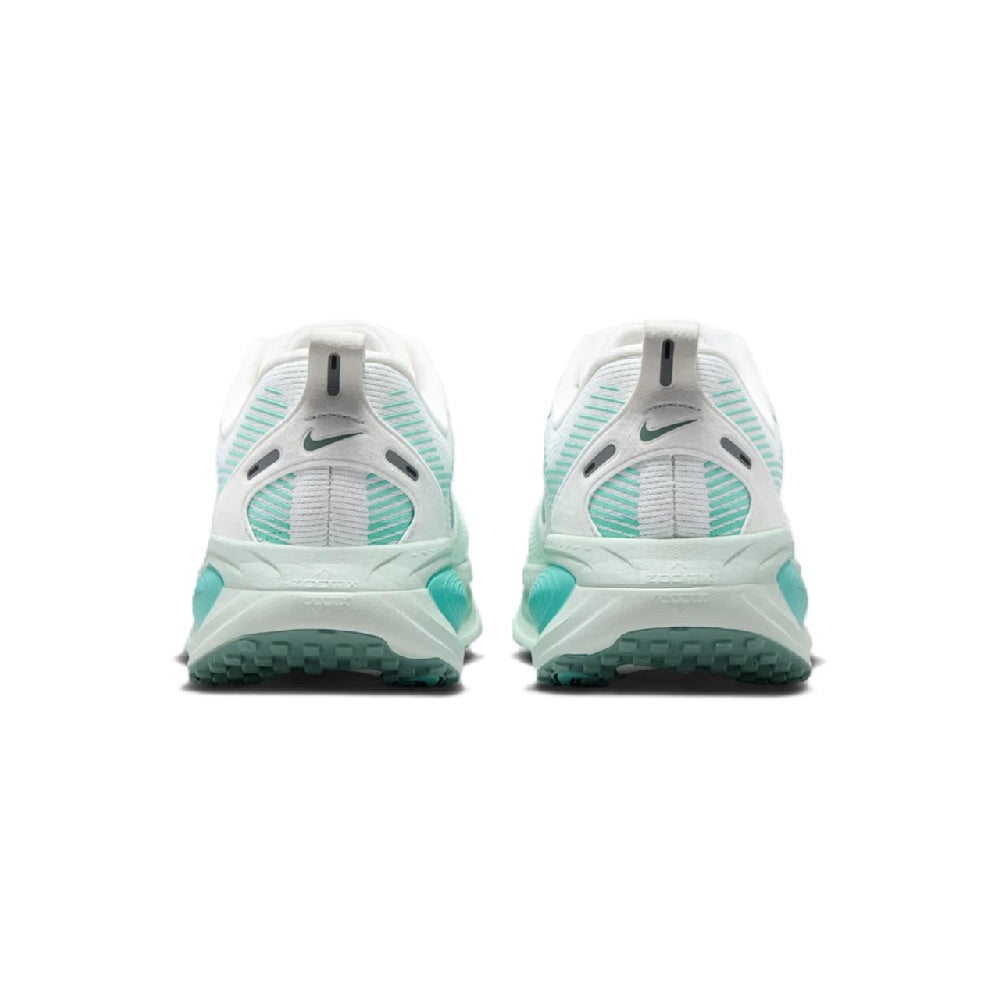 Women's running sneaker heel view: white back with turquoise midsole and small Swoosh