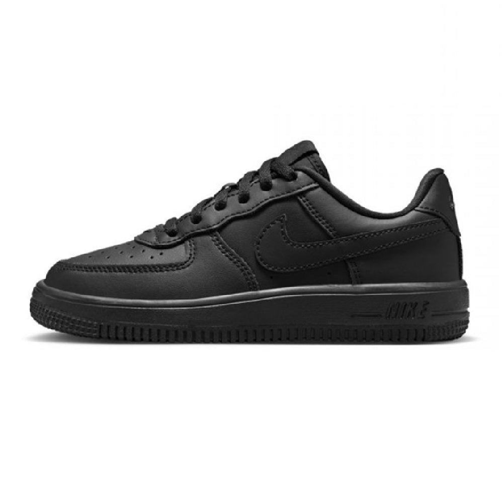 Kids’ black low-top lace sneakers with Nike logo on side and padded collar.
