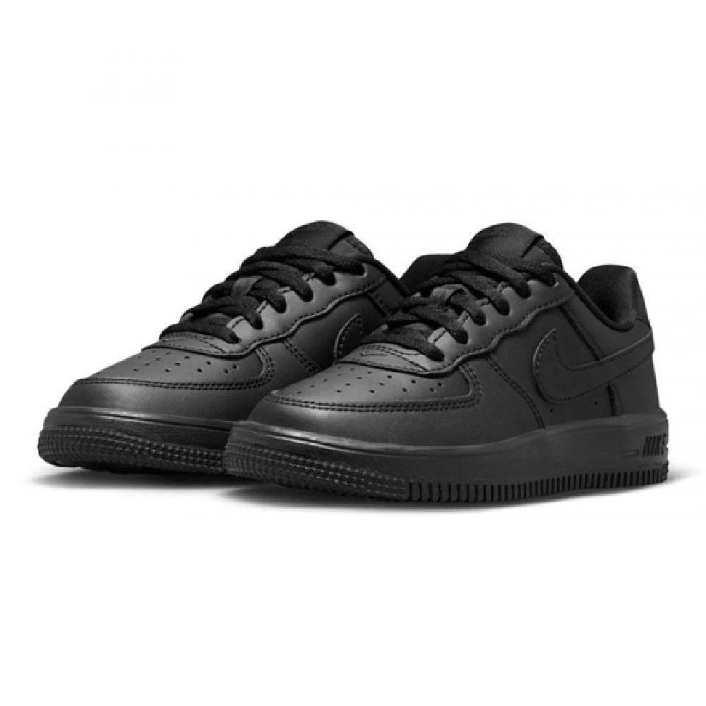 Pair of kids’ black Nike low-top lace sneakers with lace-up vamp and swoosh.