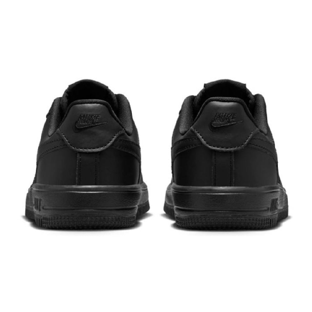 Kids’ black low-top sneakers showing rear heel and lace-up collar padding.