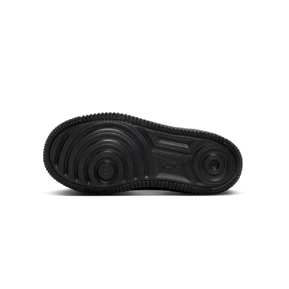 Kids' black rubber sneaker outsole with textured tread pattern