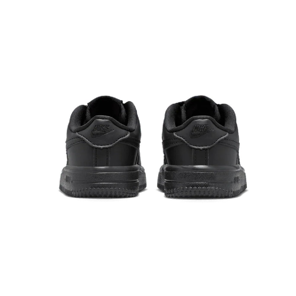 Toddler's black Nike low-top sneakers, rear view with heel tab and chunky sole
