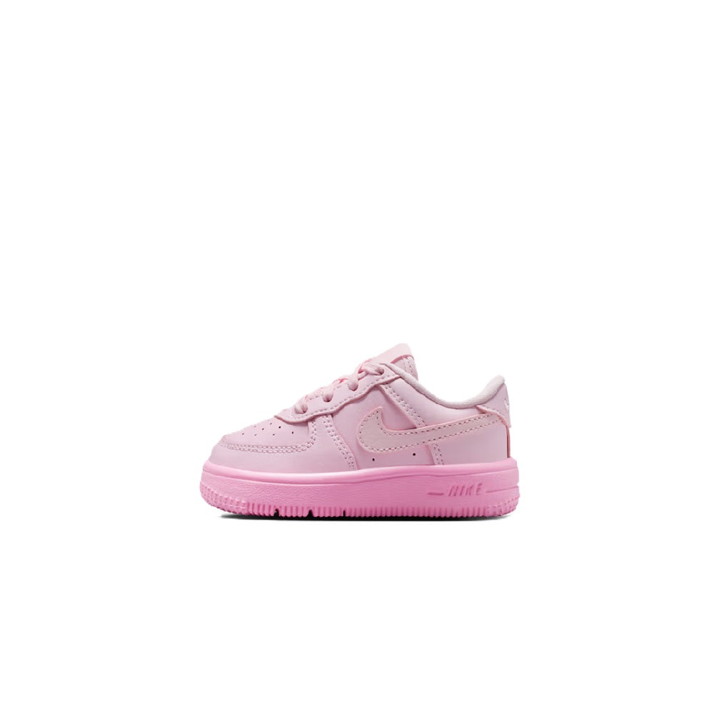 Toddler pink Nike Force 1 low-top sneakers with lace-up closure