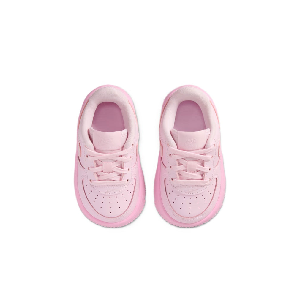 Toddler pink lace-up sneakers, front view with padded tongue