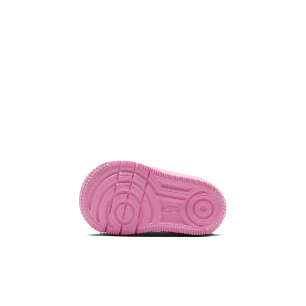 Toddler pink rubber outsole tread on low-top sneakers