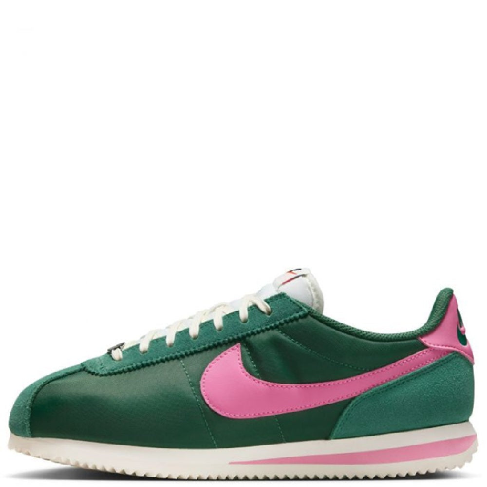 Nike Cortez sneakers in green with pink swoosh, white laces, white midsole