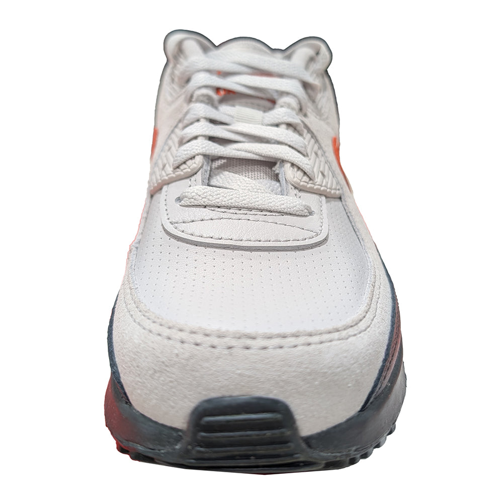 Air Max 90 SE sneaker front view, light gray upper with white laces and orange accent