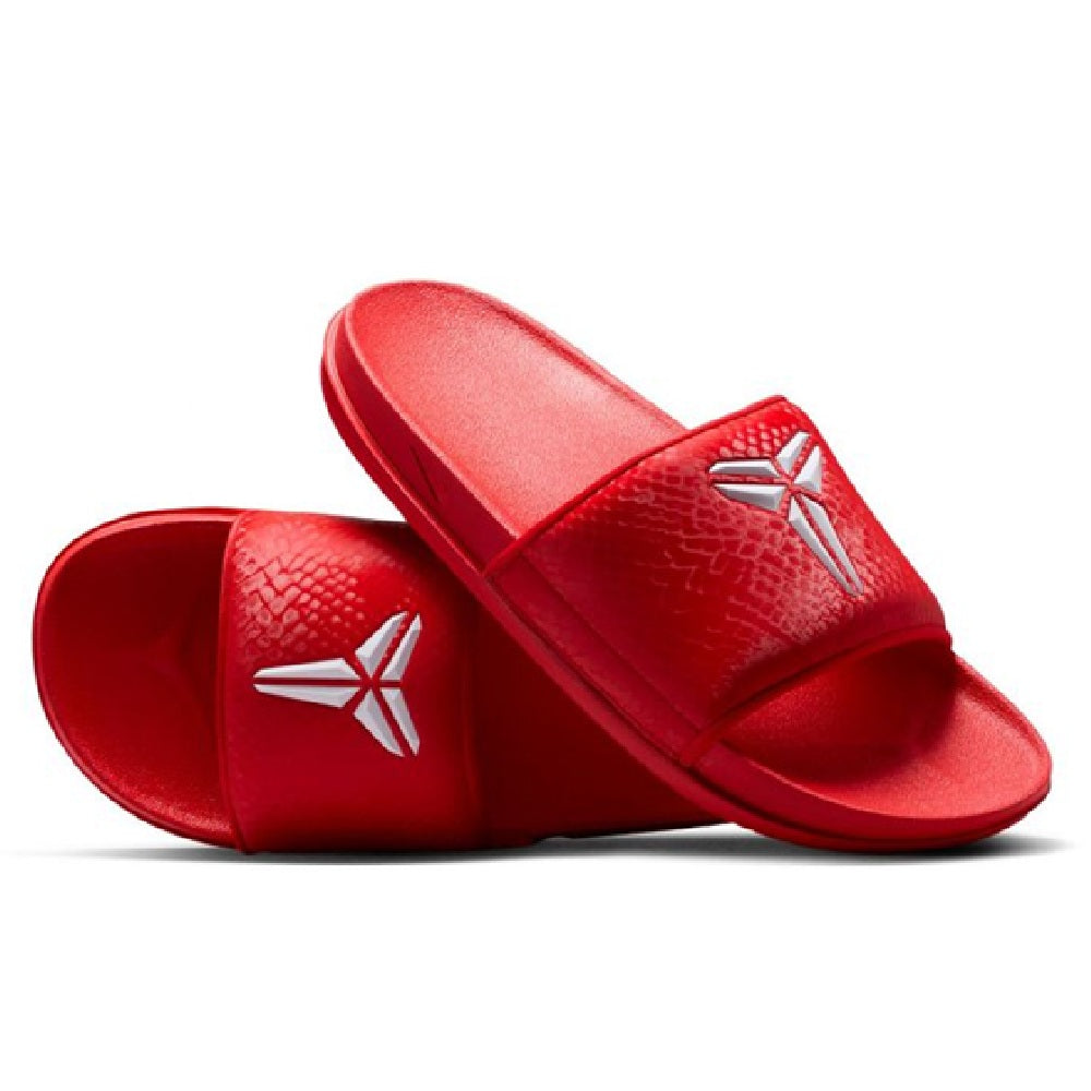 Pair of red Nike Kobe Offcourt slide sandals showing white Kobe logo