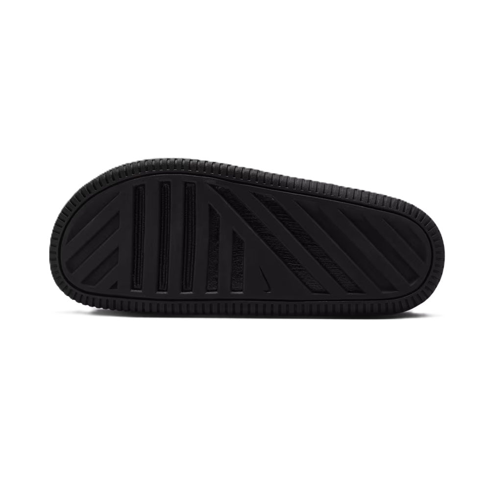 Nike Calm Slide 2.0 kids' slide sandals, black rubber outsole with traction grooves