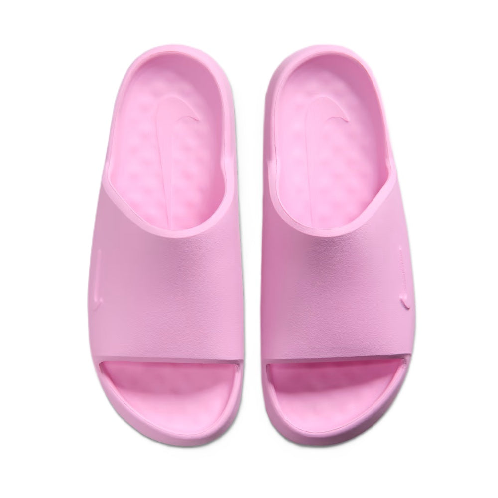 Pair of pink slide sandals with open toe and contoured footbed