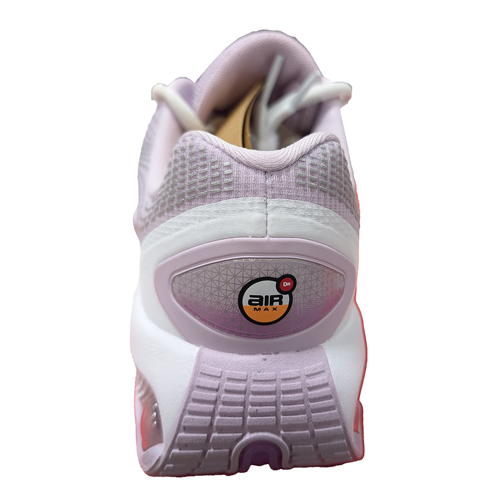 Kids' Nike sneaker back view with lilac collar, Air heel logo patch, and textured tread