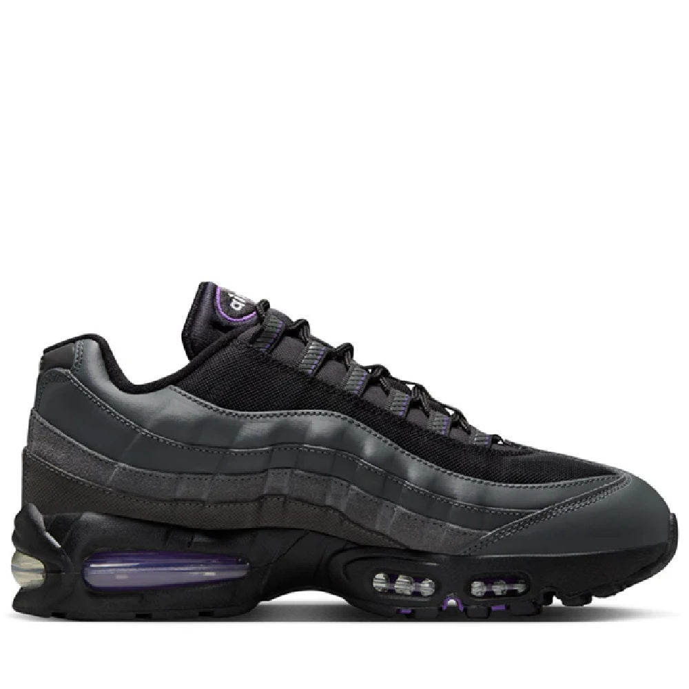 Men's Nike Air Max 95 OG sneaker, side view in dark gray/black with purple Air window.