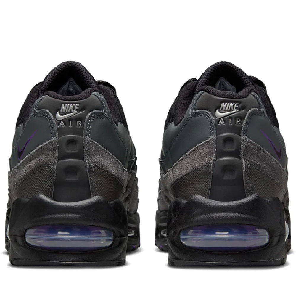 Men's Nike Air Max 95 OG sneakers, heel view in dark gray/black with purple heel Air unit.