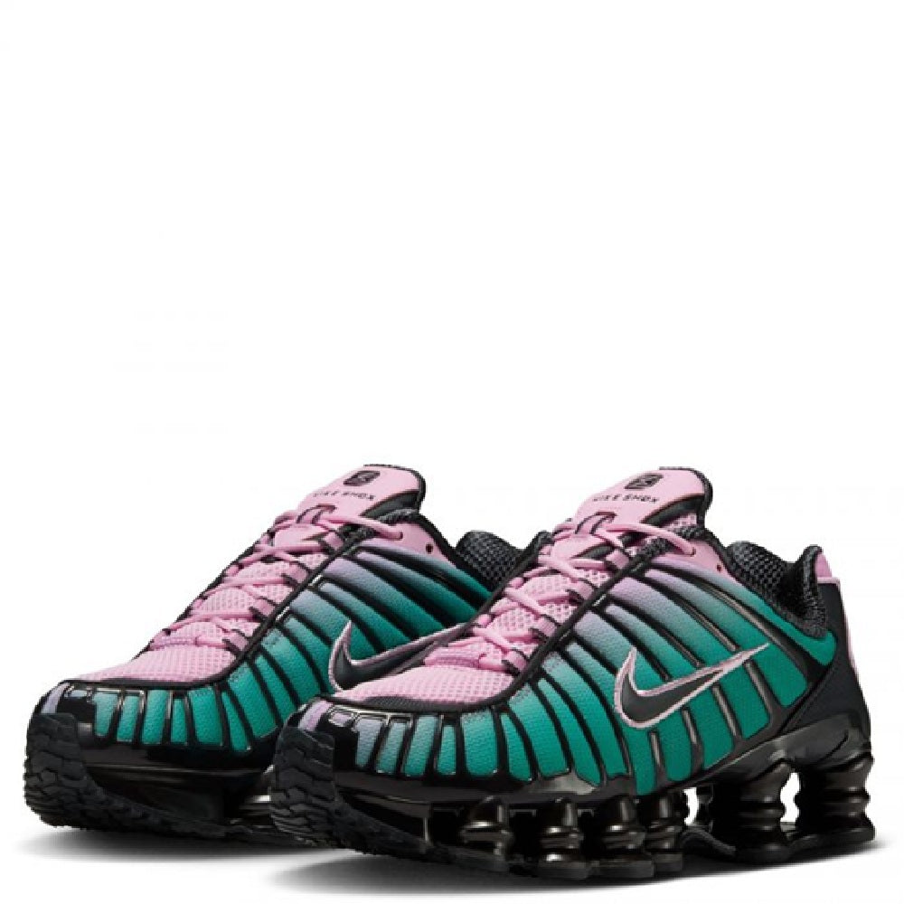Pair of Nike Shox TL fade sneakers, pink mesh uppers with teal stripes and black outsole