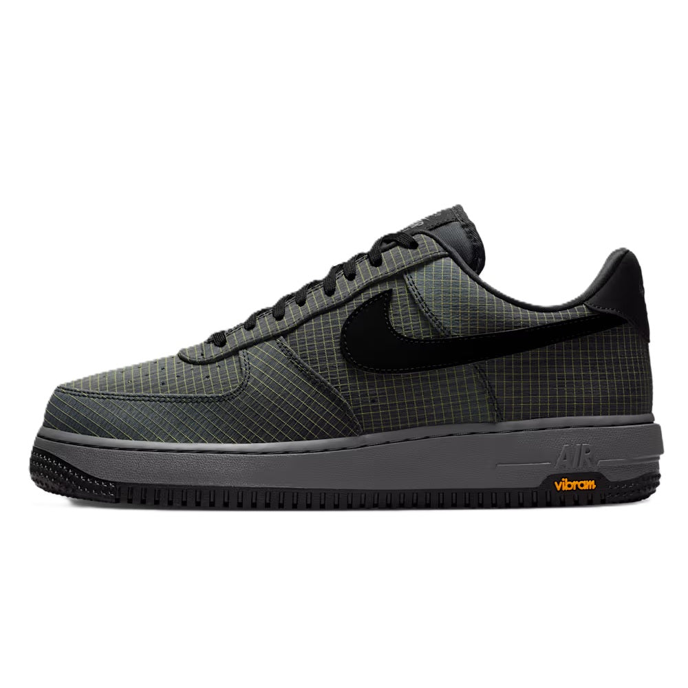 Men's Nike Air Force 1 low-top sneakers with black Swoosh, lace-up, and Vibram sole