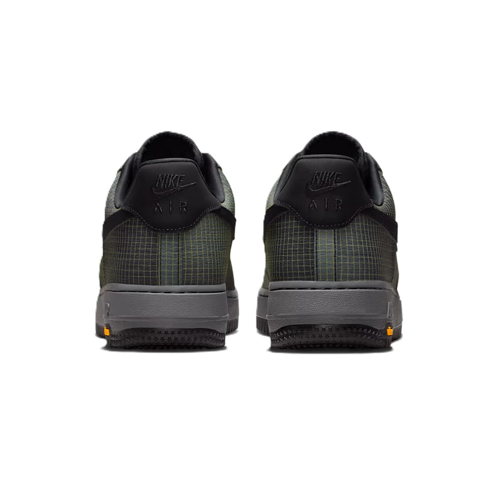 Back view of men's Nike Air Force 1 low-top sneakers with Air-branded heel
