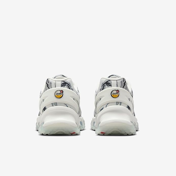 Nike Air Max DN8 PRM sneakers, heel view, white upper with gray accents and air sole