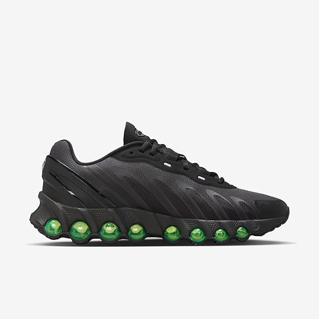 Black running sneaker with green pod-style Air bubble outsole and lace-up front