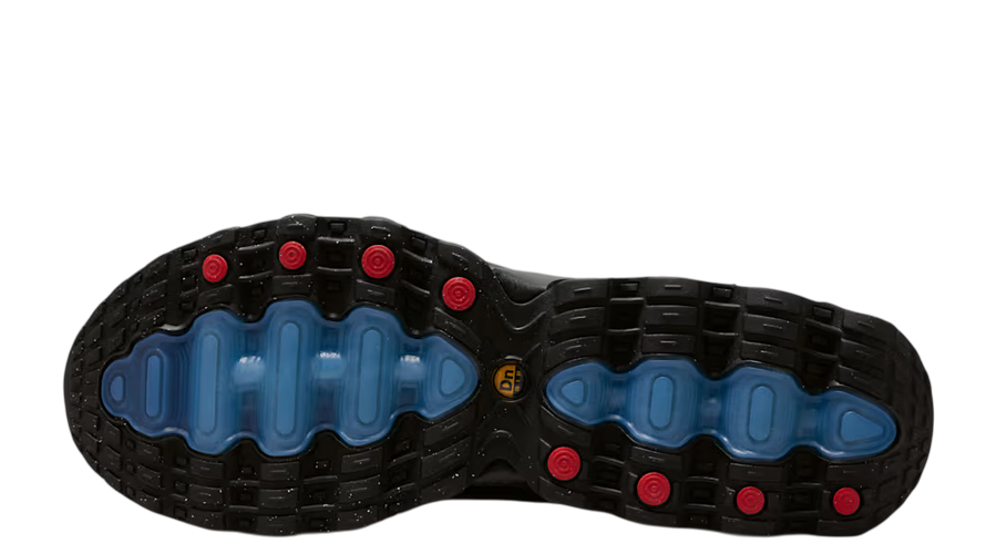 Nike Air Max DN8 outsole, black tread with blue cushioning pods and traction nubs
