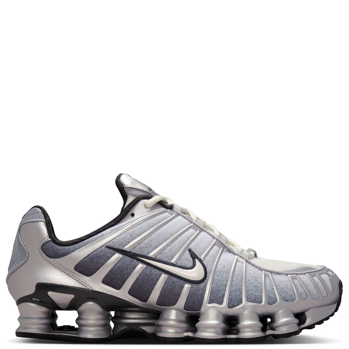 Men's Nike Shox TL metallic silver sneaker with lace-up front and black heel accents